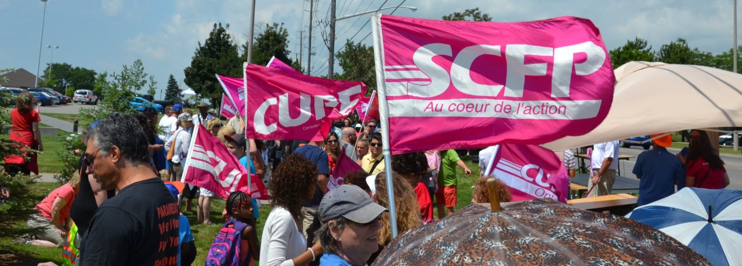 Members outside with flags