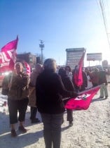Members with flags rallying
