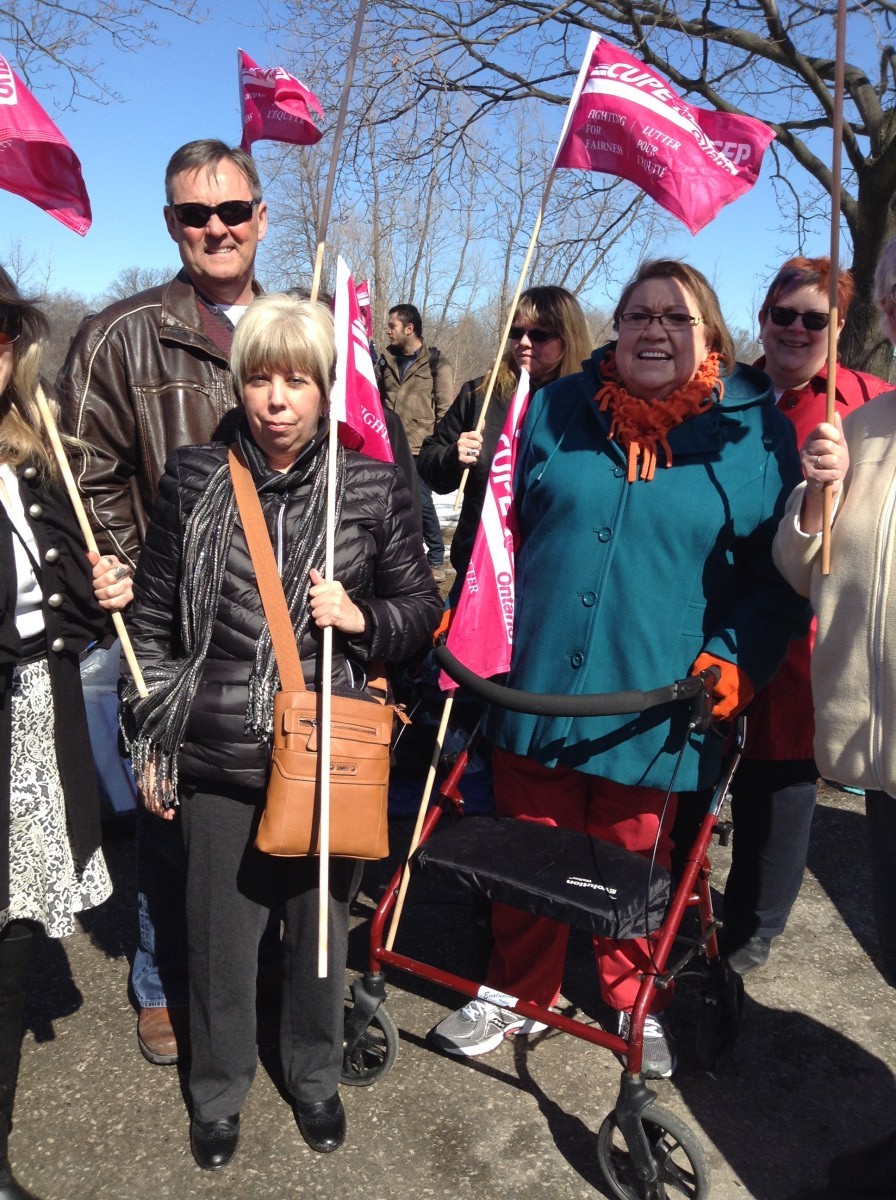 Members stand at a CUPE 3903 Rally