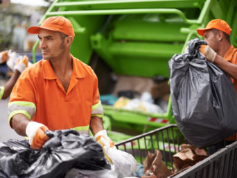 Cropped shot of a garbage collection team at work