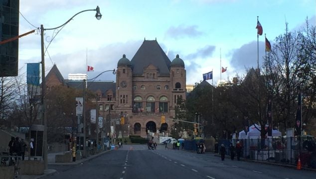 Image shows Queen's Park buildings, looking north from University Avenue's broad street.